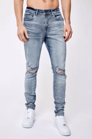 SKINNY FIT JEANS - LIGHT BLUE OVERDYE DESTROYED KNEE